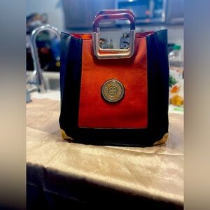 Women’s bag black and orange and gold